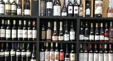 Why is it recommended to buy wine from specialized wine stores?